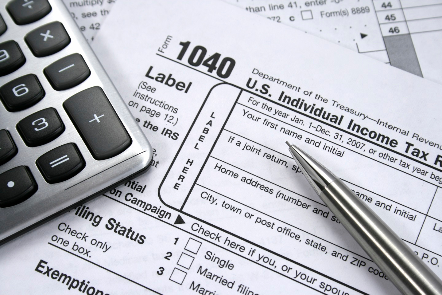 How can American expats exclude their income from US tax liability?